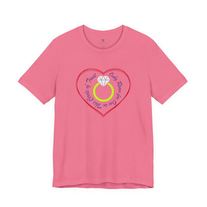 Pink t-shirt with a heart-shaped design featuring a diamond ring on a white background